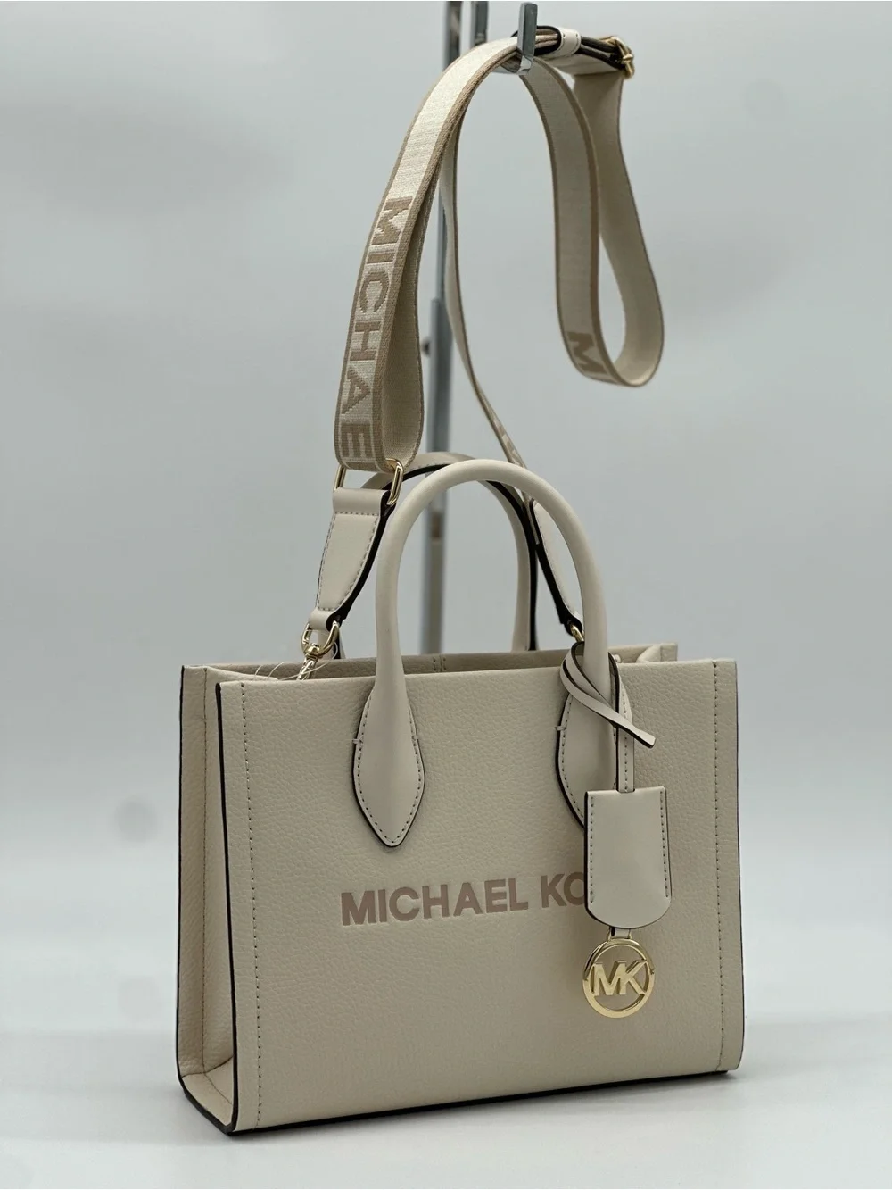 Michael Kors Cream Pebbled Leather Satchel with Logo Strap